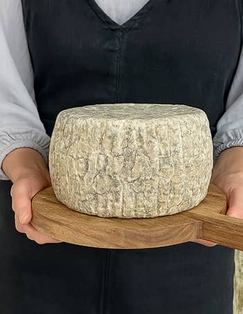 Wheel of handcrafted cheese